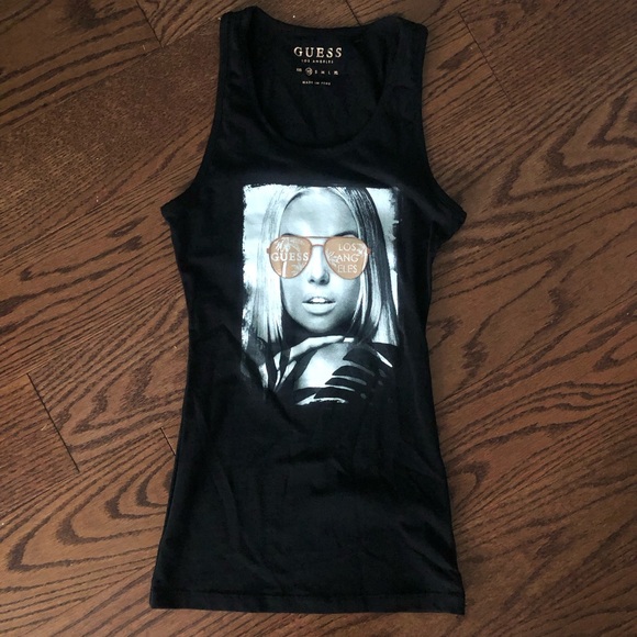 Guess Black Tank Top Showing a Beautiful Woman Wearing Coper Aviator Sunglasses - Picture 1 of 4